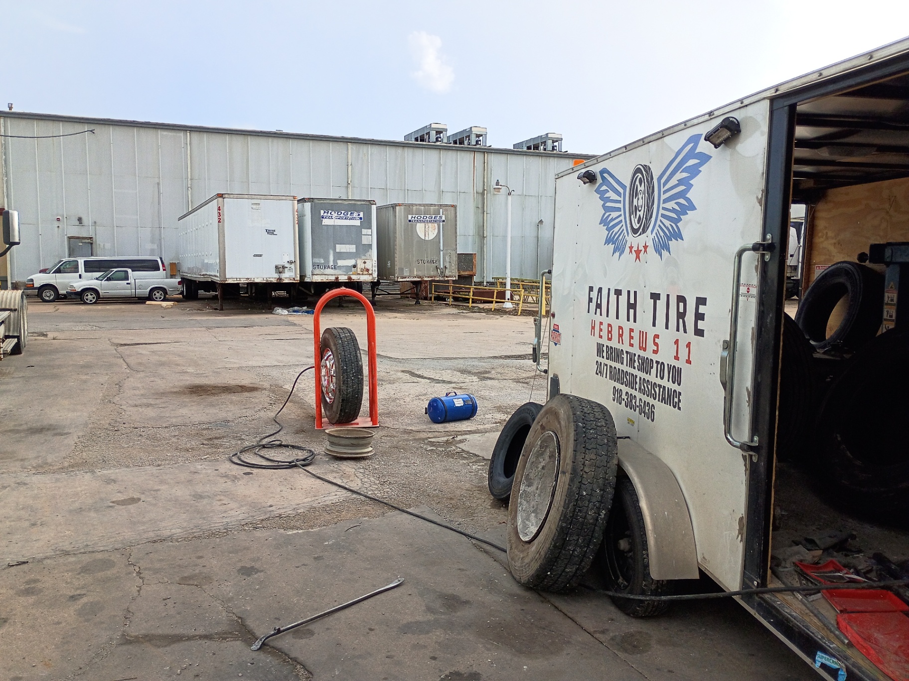 Faith Tire service trailer on a fleet job site